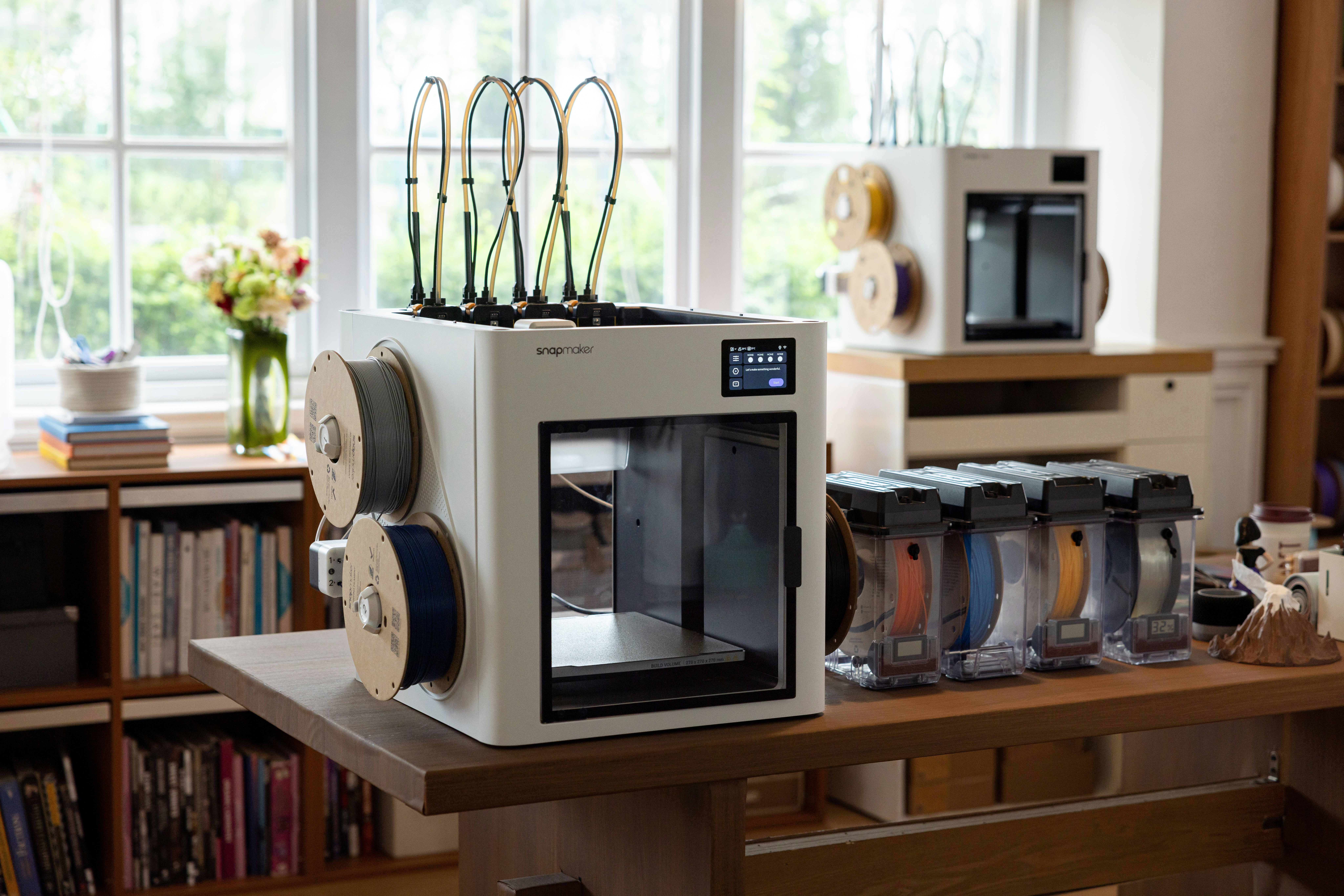 Professional Bambu Lab 3D printer in a multi-printer farm operation